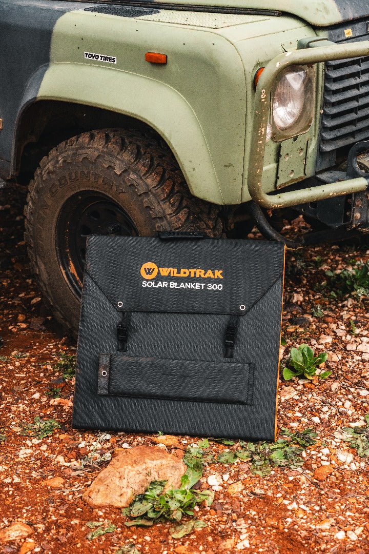 Wildtrak™ 300W Folding Solar Blanket (A-Grade with ETFE Coating, Built in Stand, IP65 Waterproof & Carry Bag) for Off-Grid Living, Camping, 4WD & Caravan Adventures